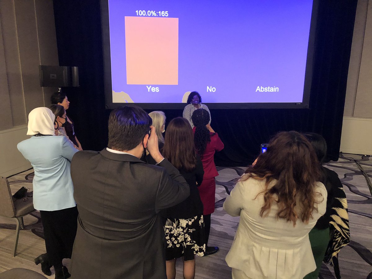 aliciacollin's tweet photo. People lining up to take pictures with @JFK4APA and @DrMaysaAkbar with the vote tally. https://t.co/YvH0V4xUks