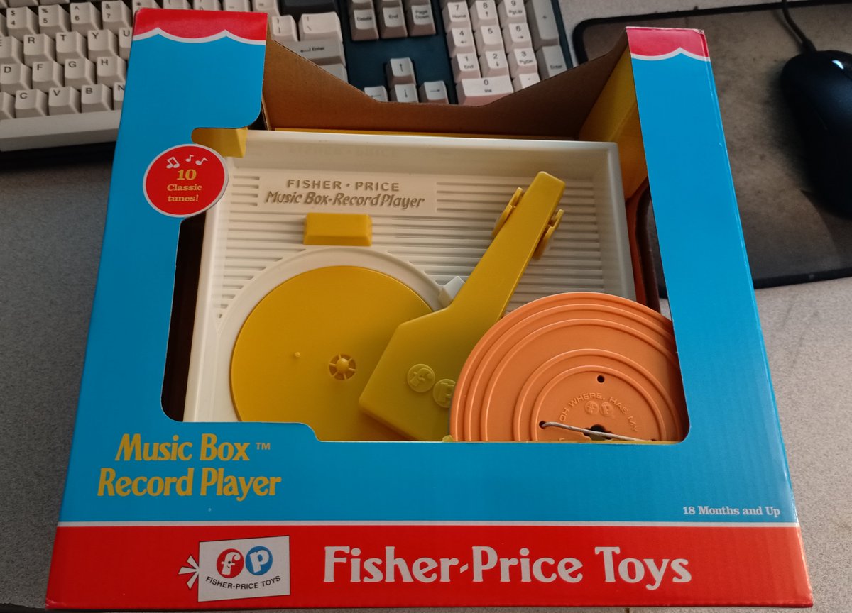 So, starting in 2010 Fisher Price re-released their Music Box Record Player, in a classic-toy version that doesn't work like the original. I got one, so I'm gonna take it apart