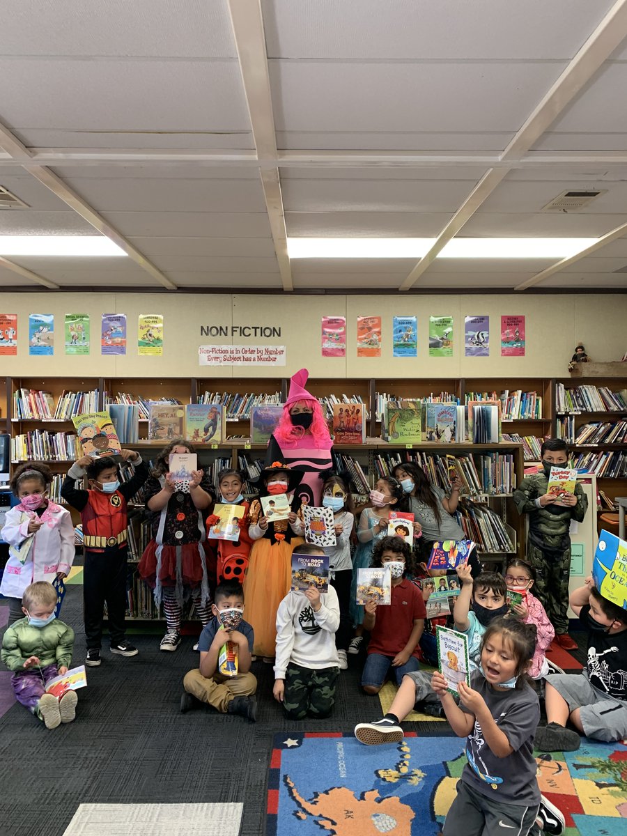 MacQuiddyElem's tweet photo. Halloween in the MacQuiddy library! Staff after the parade #halloween @PVUSD 
Have a safe Halloween weekend! There is no school for students this Monday :) 🎃🐈‍⬛ https://t.co/M4Kl8NoBPI