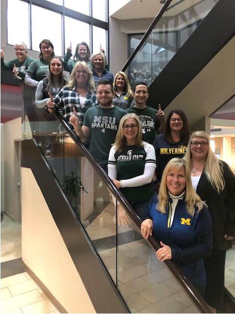 myFPCU's tweet photo. Our employees are ready for the BIG GAME tomorrow! Who do you think will take home the Paul Bunyan trophy?🏆 https://t.co/b1SFm7V7lF