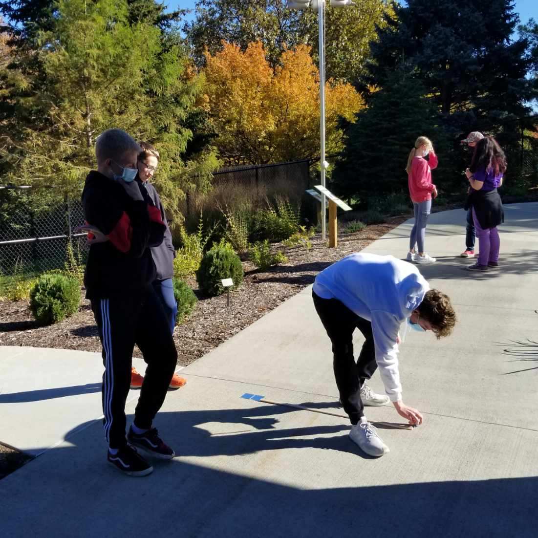 LPSScienceFocus's tweet photo. Geometry class using similar triangles to find the height: BOO sign, Purple Martin nest, light pole, chimney sweep house, SFP building. #OutdoorMath https://t.co/SZTeqgbNTa