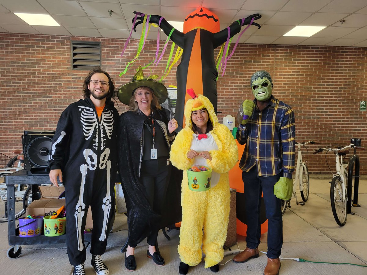 RealPage's tweet photo. High winds in Richardson didn’t deter our HR team from dressing up and passing out candy during RealPage’s drive-through Trick or Treat event. Fun like this is why we #Work4RP: https://t.co/HCut8zxZRQ. #Jobs https://t.co/cebH92ThVp