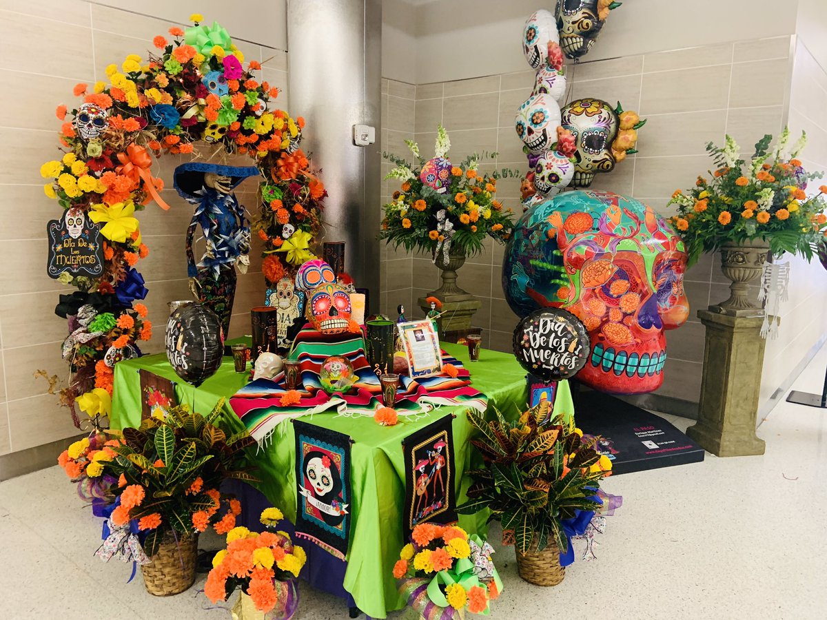 SATairport's tweet photo. Day of the Dead ofrenda at SAT 💀 Calaveras courtesy of @DayoftheDeadSA #DODSA #flyeasier #flysanantonio https://t.co/jhrhKdpowk