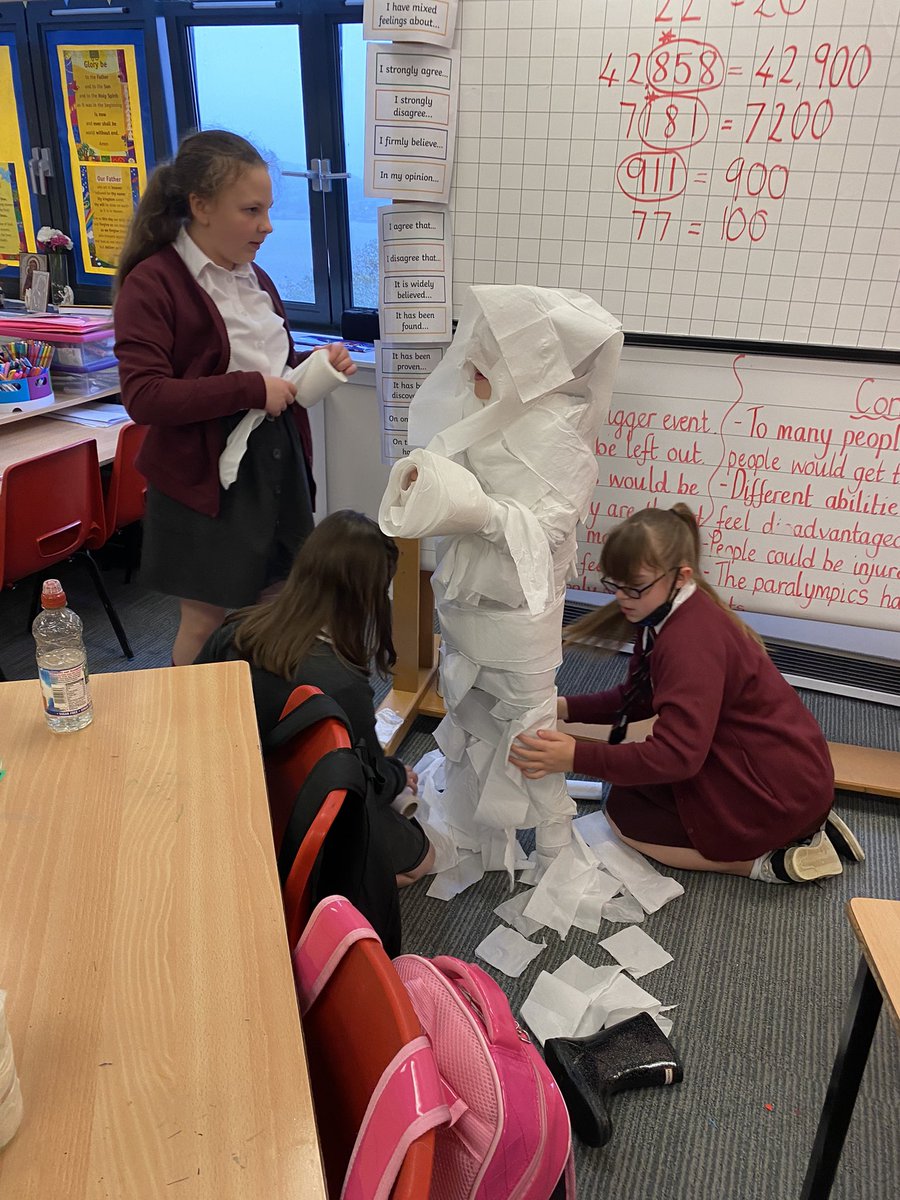 StMichaelsMissD's tweet photo. Super Mummy’s 🙌🏻 Great Team Work! Can you guess who is hiding in there? #fun #halloween https://t.co/TSbRR4rZWw