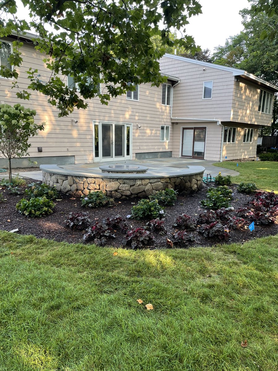 KandR_Landscape's tweet photo. Here are some pictures of a project we completed about a month ago, bluestone patio with a sitting wall and fire pit. We also installed a small fish pond surrounded by some boulders and new plantings, topped off with a new @Sodco_Turf lawn #bluestonepatio #firepit #kandrlandscape https://t.co/xRP1FWH2jf