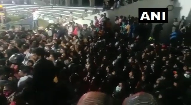 ANI's tweet photo. Bengaluru, Karnataka |  Fans paid last respects to  Kannada actor Puneeth Rajkumar at Kanteerava Stadium, late last night.

His last rites of will be done with state honours, soon after his daughter arrives from the US. https://t.co/SkIT0tOjnH