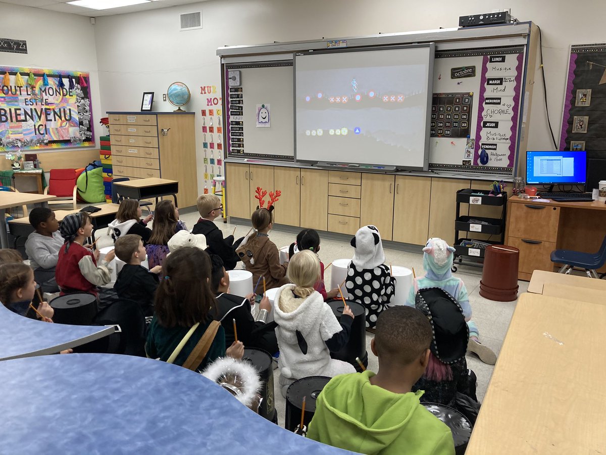 MlleSheppard's tweet photo. Oh bother! I spent way too long trying to think of a Winnie the Pooh pun, but we had a pretty sweet day in grade 3 nonetheless. Happy (early) Halloween y’all! 🎃 #rdcrs #WinnieThePooh #bucketdrumming https://t.co/9ixDQ6mNUe
