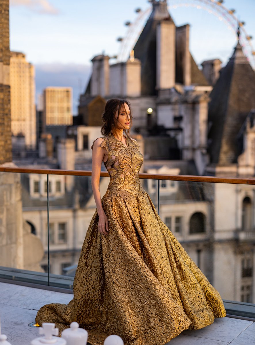 voguemagazine's tweet photo. Angelina Jolie just embraced runway glamour in Rome.

Here are the details behind her look: https://t.co/meADNNYRMV https://t.co/4z7HbEm0Zm
