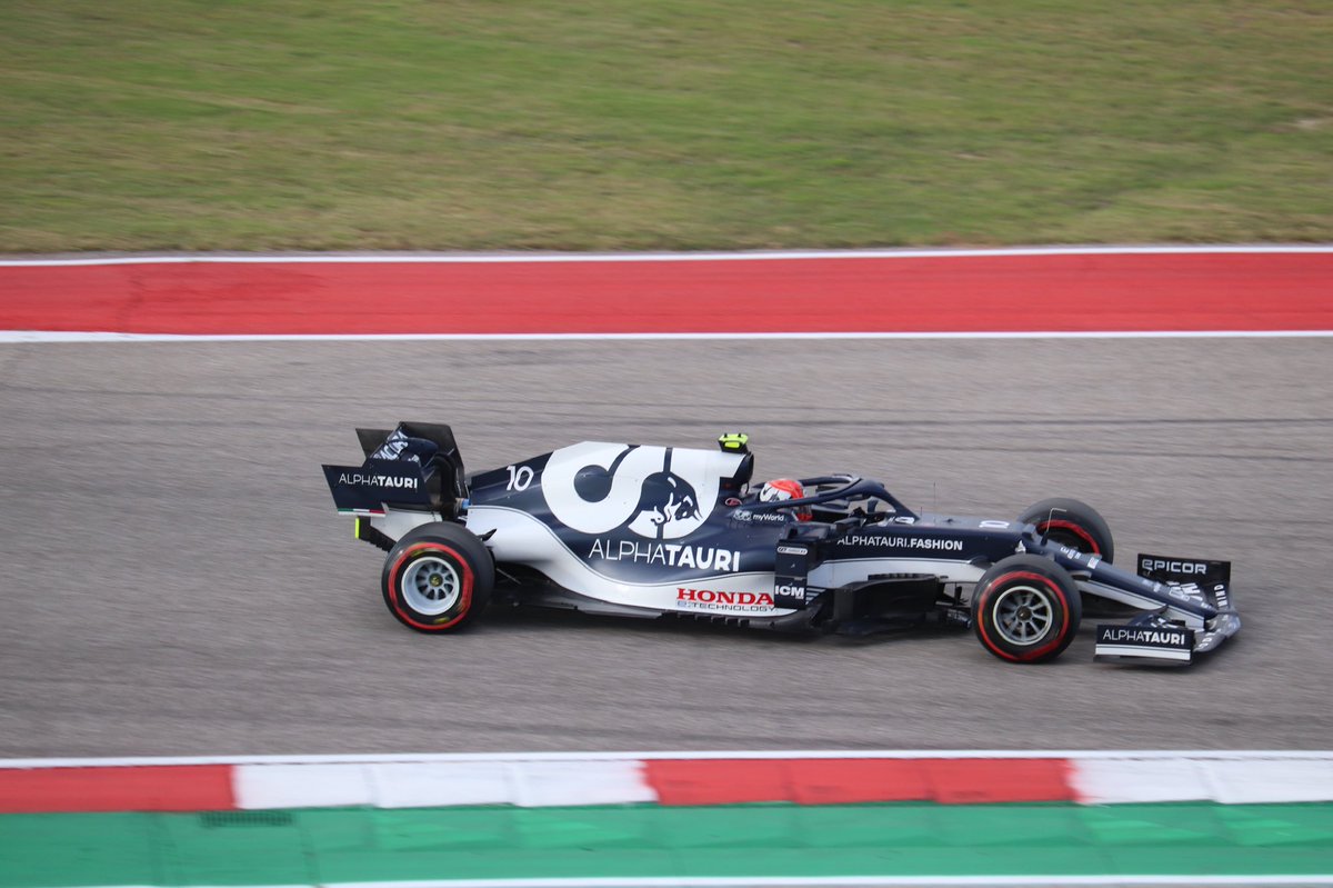 aydan_erkin's tweet photo. choosing to believe that @PierreGASLY turned around and waved at me after screaming his name #futurewdc #usgp 
(also just look at this pic i took of the car yall i’m obsessed) https://t.co/rAaj8IXwni