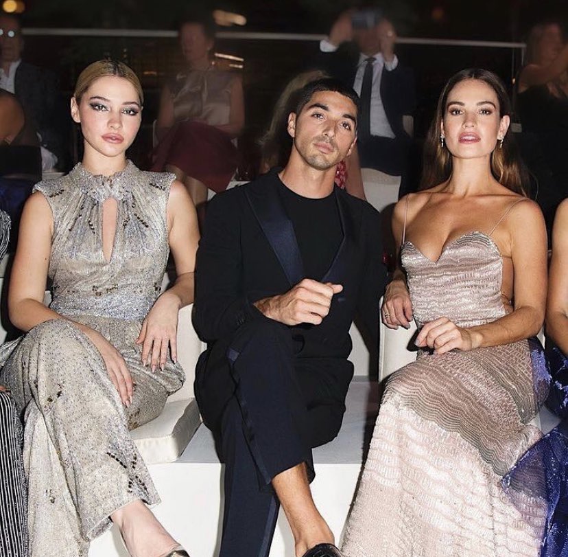 LILYJAMESSTYLE1's tweet photo. Madelyn Cline Taylor Zakhar and Lily James front row at the Giorgio Armani’s #GAOneNightOnly event held in Armani Hotel Dubai. 10/26/21 https://t.co/ny7grZ1eHc