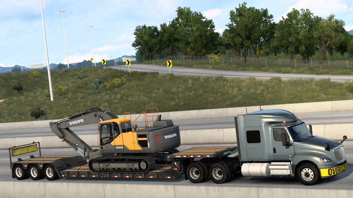 supersobes911t's tweet photo. Rolling through #Denver on #Interstate25 with this #Volvo EC220E. @SCSsoftware @VolvoCE_NA #AmericanTruckSimualtor #Trucking #VirtualTrucking https://t.co/cIv0MYqZ3w