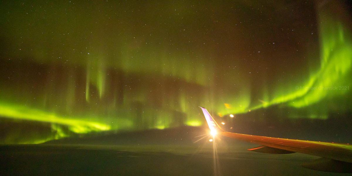 charnick_wx's tweet photo. KP2 Aurora sampler...somewhere over the Labrador Sea! 
#aurora https://t.co/NKmXyEkj1F