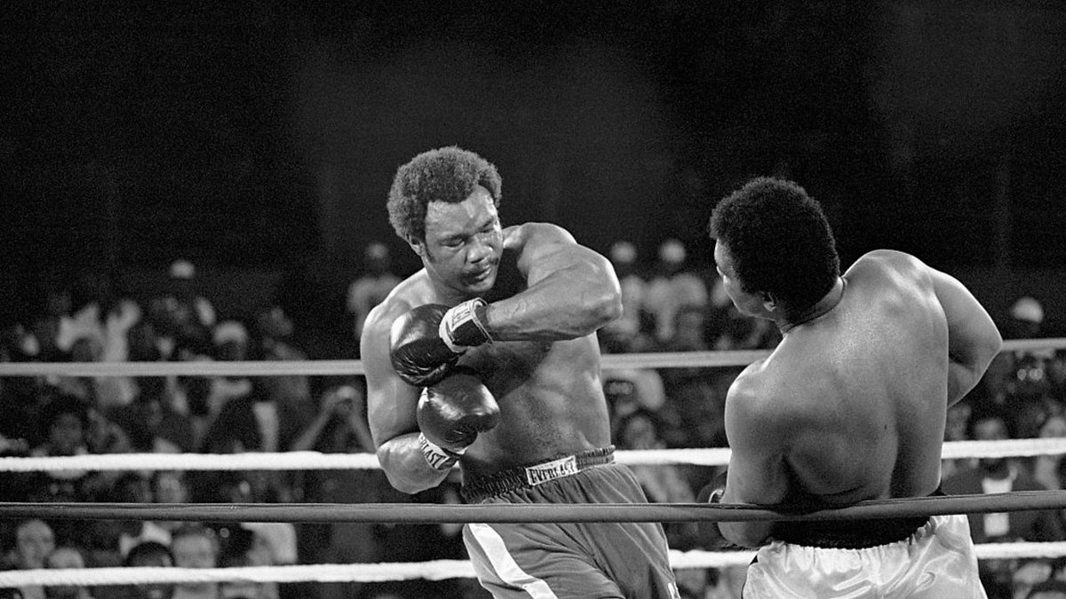 A black and white photograph taken during the George Foreman vs Muhammad Ali Rumble in the Jungle boxing match on 30 October 1974