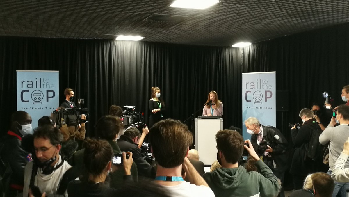 Powerful opening speech by <a href="/adelaidecharli2/">Adélaïde Charlier</a> from @youth4climateBE at the terminal in Bruxelles-Midi. Dozens of activists, NGO's, scientists and politicians gathering here. Soon we'll all be going to Glasgow together via <a href="/railtothecop/">Rail to the COP</a>! #COP26