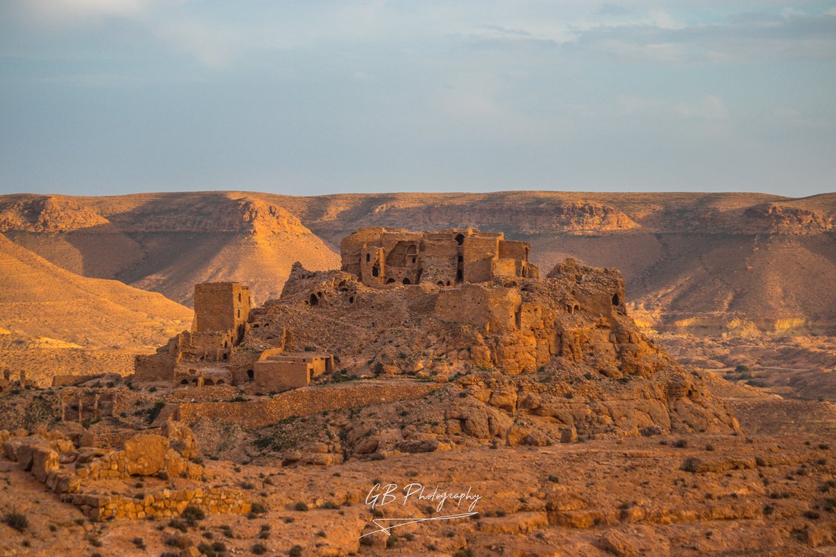 AfrikyaTN's tweet photo. Let the discovery begin! Here we fly over #Africa's alien world only to meet an abandoned, curious settlement, zealously nested amid #Sahara valleys, depicting #Tunisia's resilient #Amazigh heritage, in Douiret by Tataouine, explored and shot by Belga Guemri 

@khadija2m @Mira404 https://t.co/kxSEufO58L