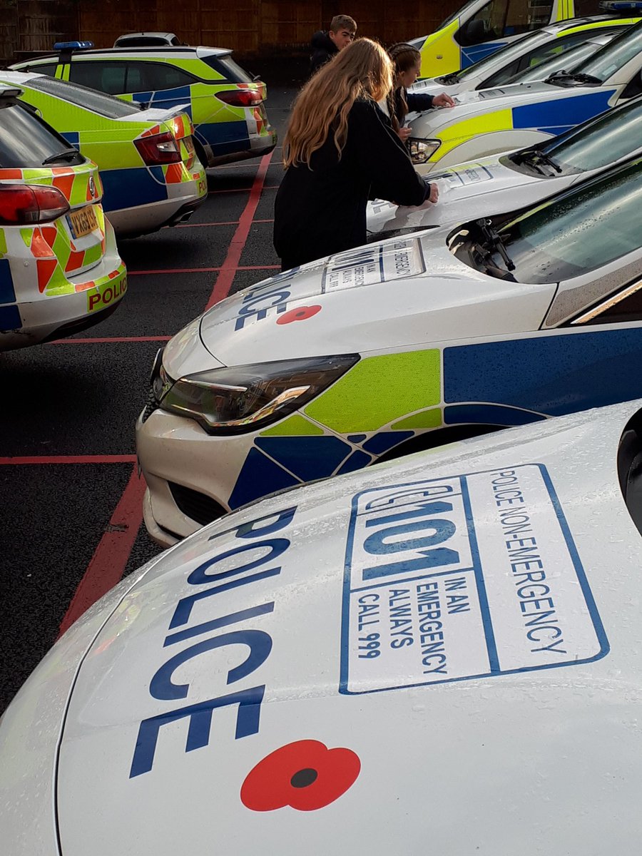 #Poppies on #PoliceCars the Cadets braving the early morning rain as we show our #respects #LestWeForget