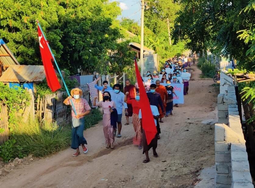 Hha__1998's tweet photo. Never Cold Blooded Pro-democracy Locals from PhaungKar Village marched on the streets to overthrow the Military Dictatorship. 

#WarCrimesOfJunta
#Oct30Coup  
#WhatsHappeningInMyanmar https://t.co/XEDj21c8bm