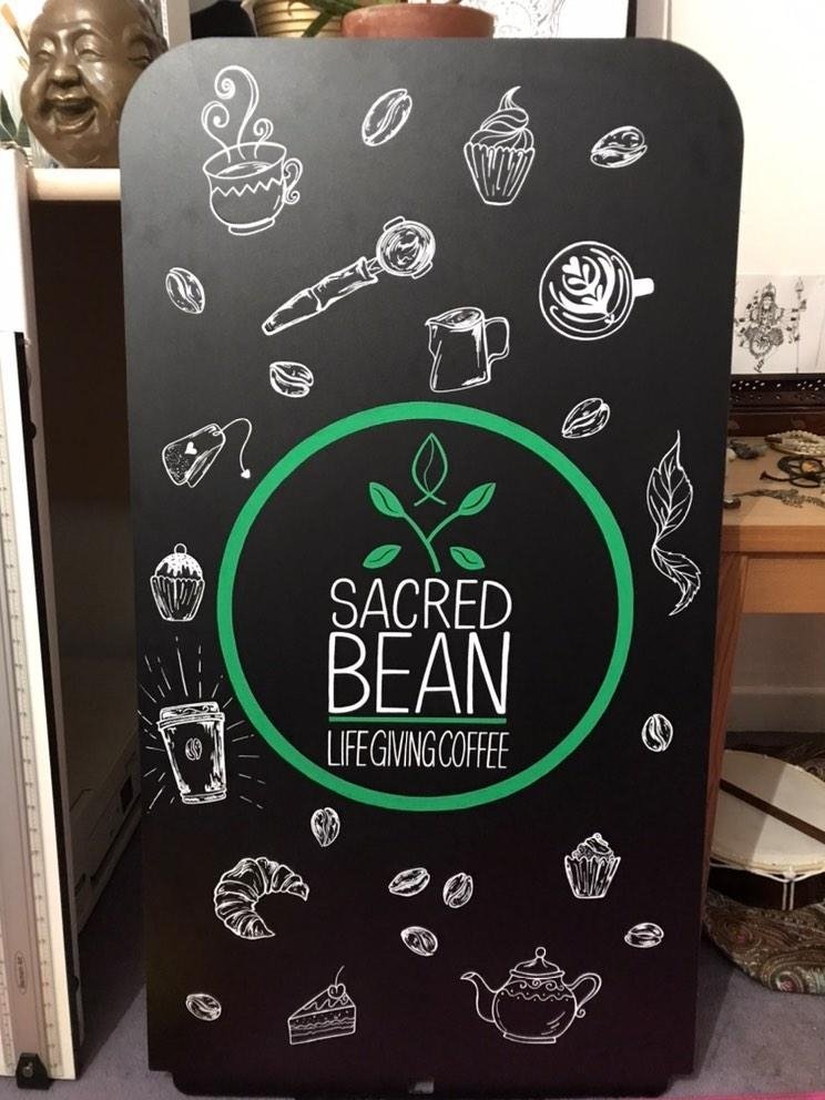 BeanSacred's tweet photo. We'll chuffed with our new outdoor boards, capturing what we're about and what we do. Thanks Jess. 

Roll on outdoor seating,getting there. 

Get yourself down to our cafe this Wednesday afternoon to catch a glimpse of another local artist, Victoria Wilcox, painting with coffee. https://t.co/0uksFtE9OZ