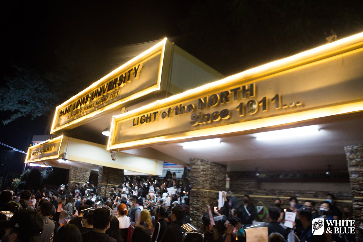ABSCBNNews's tweet photo. LOOK: Saint Louis University students in Baguio City hold a candle-lighting protest on Saturday, urging school officials to let them take a break from academic requirements. (📸: White and Blue SLU) | via @kennedyzcaacbay https://t.co/pEFTWigDwu