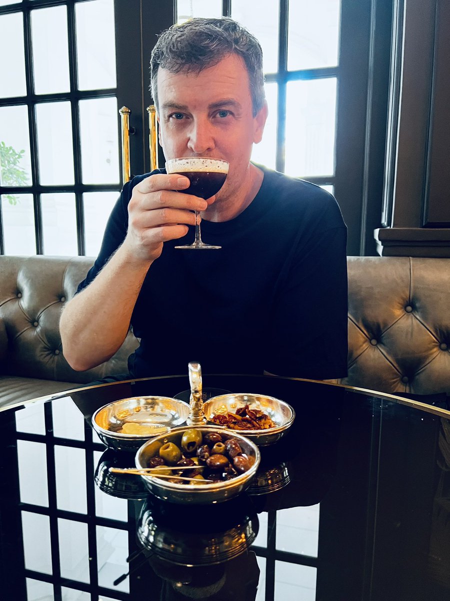 PeterAForeman's tweet photo. Espresso Martini. Saturday cocktail hour .. Writers Bar @RafflesHotelSIN https://t.co/4voa91nMMK