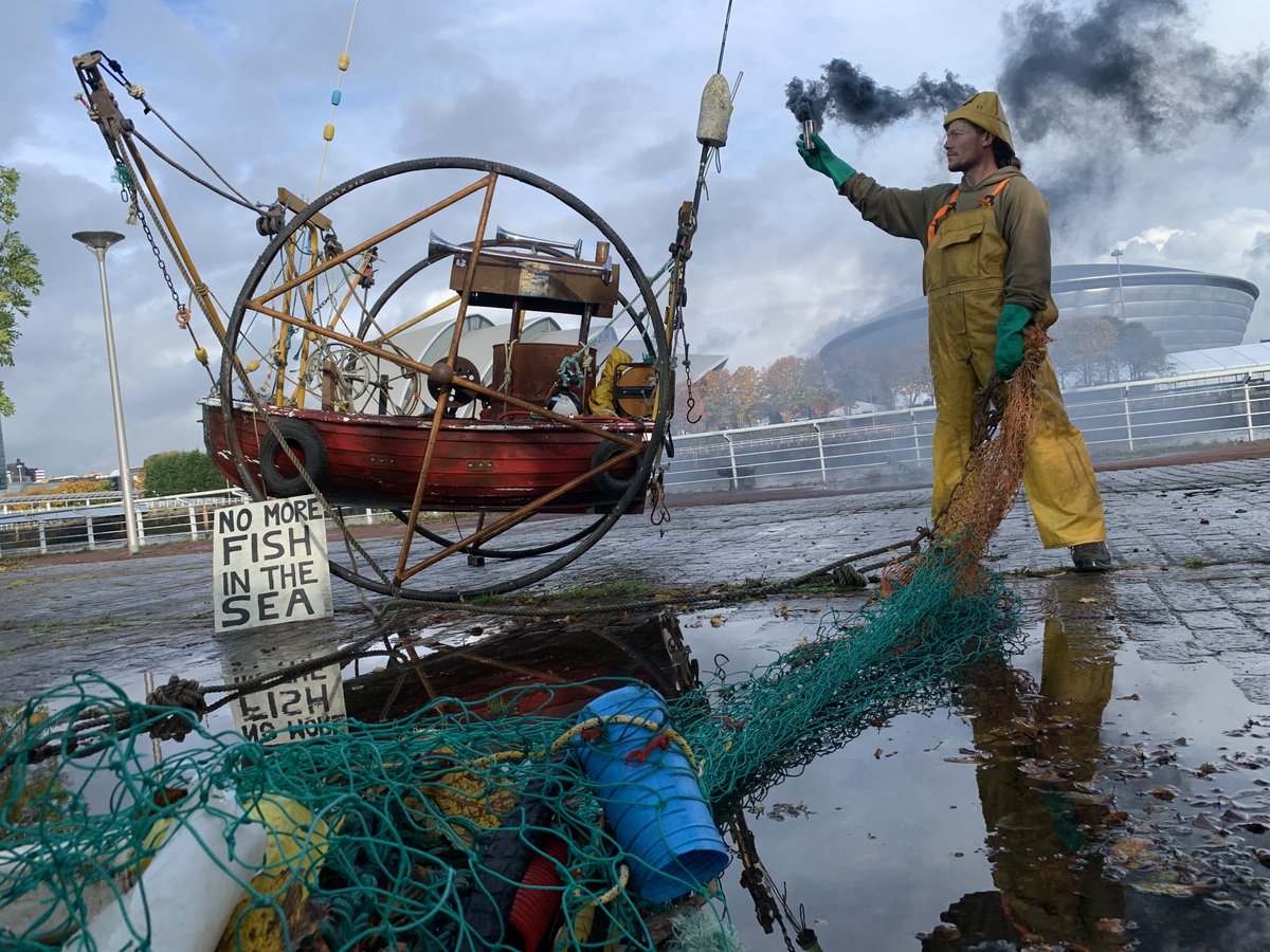 oceanrebellion's tweet photo. Ocean Rebellion sounded the alarm outside Glasgow's #CoP26 venue today, calling on world leaders to keep our ocean alive, and for an immediate global ban on destructive bottom trawling.
#NoMoreFishInTheSea
#DontTouchMyBottom
#AsTheSeaDiesWeDie
#BottomTrawlingIsKillingUs https://t.co/YbVODxeuY6