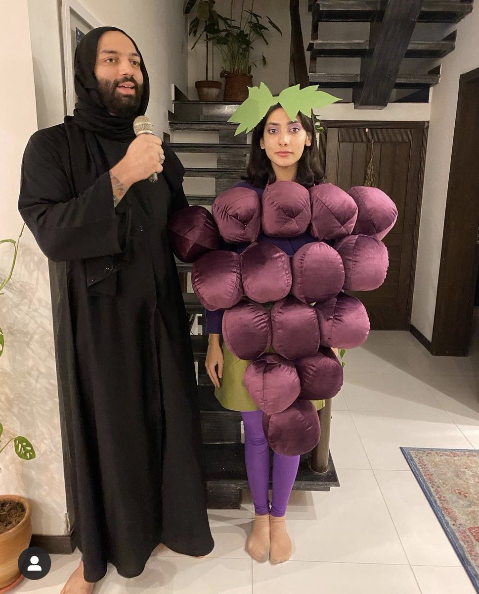 Eman suleman and her husband won halloween with this grape costume