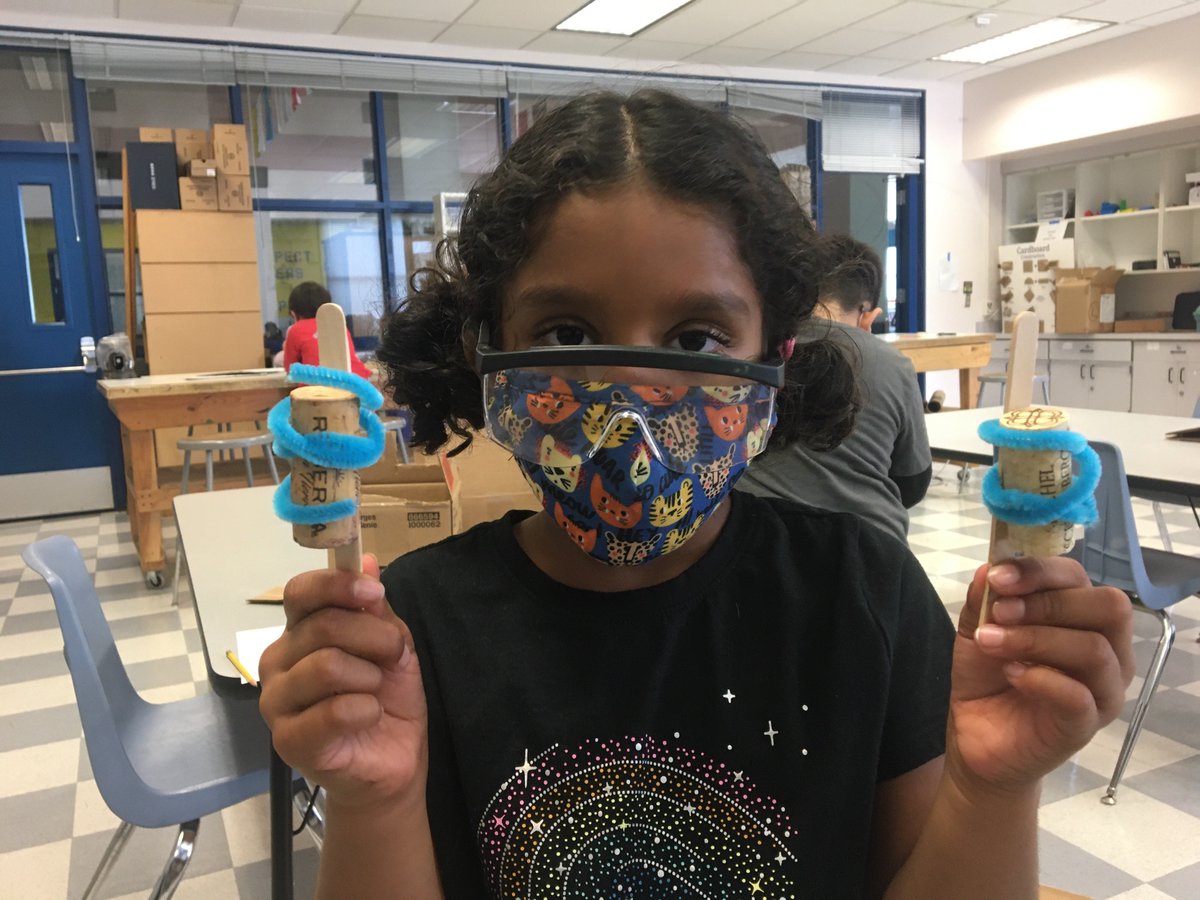 DeVargasSchool's tweet photo. This student made a pair of tiny elevators during after-school Tinker Time. She was amazed to learn that people are working on elevators that will travel into geosynchronous orbit. #MakerEd #MakerSpaces https://t.co/ycQQakSMrv