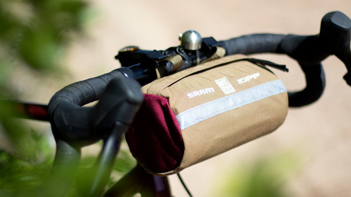 SRAMroad's tweet photo. How much Halloween candy fits in this handlebar bag? Experts say it can hold a pound of gummy bears. This bag and much more are now available to order through our SRAMNation store. Shop #XPLRcollection swag now: https://t.co/ealwGtpT24 https://t.co/zt034oFw8B