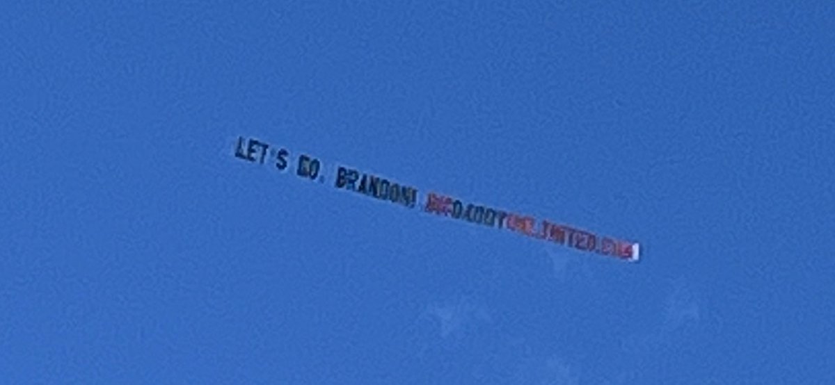 ClayTravis's tweet photo. There is a “Let’s Go Brandon” banner flying over the Florida-Georgia game. https://t.co/Mg3zl7LmrC
