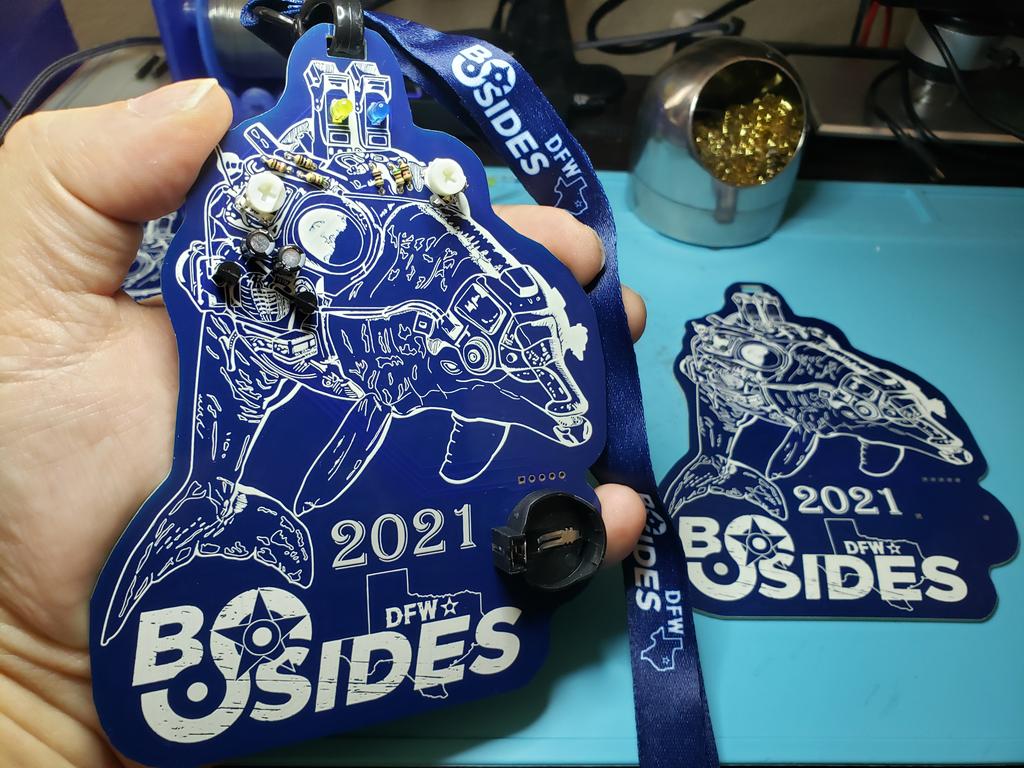 alt_bier's tweet image. The PCBs for the @BSidesDFW #badgelife came in today.  @PCBWayOfficial did an awesome job.  All the art detail turned out perfect.  Just have to bag up and distribute 300 kits now.