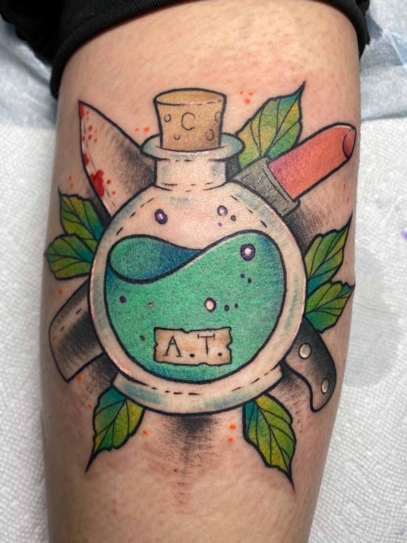 Aqua tofana tattoo