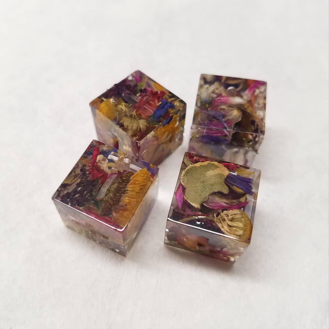 alchemist_attic's tweet photo. Did I add enough flowers to these dice, you think? (These are fresh from the molds, unsanded and uninked)
#handmadedice #dice #resin #dnd #dungeonsanddragons #fatedice #fudgedice #flowers https://t.co/6pjHDBD46T