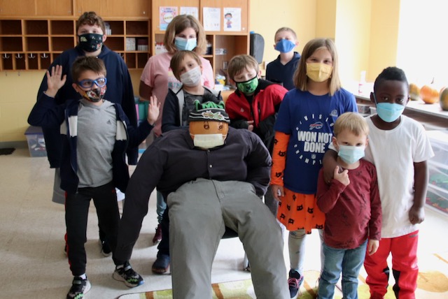 WCSDProud's tweet photo. @OwlWcsd celebrated their 1st month of OWL bucks with cider &amp; donuts, scarecrow making, painting &amp; movie watching to honor the students for following CARE expectations by collaborating with their peers, helping younger students &amp; following the group plan. https://t.co/b3rXlKkDkj