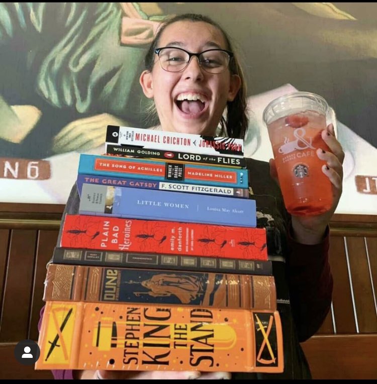 BNBeavercreek's tweet photo. Meet Norah!! She is our first bookseller/barista spotlight. This stack are books she hopes to get to soon as well as a favorite, Jurassic Park. She recommends the Strawberry Acai Refresher, her favorite 📚🍓 #barnesandnoble #bncafe #bnrecommends #bnrockstars @BNBuzz @StephenKing https://t.co/V23v5fGwkD