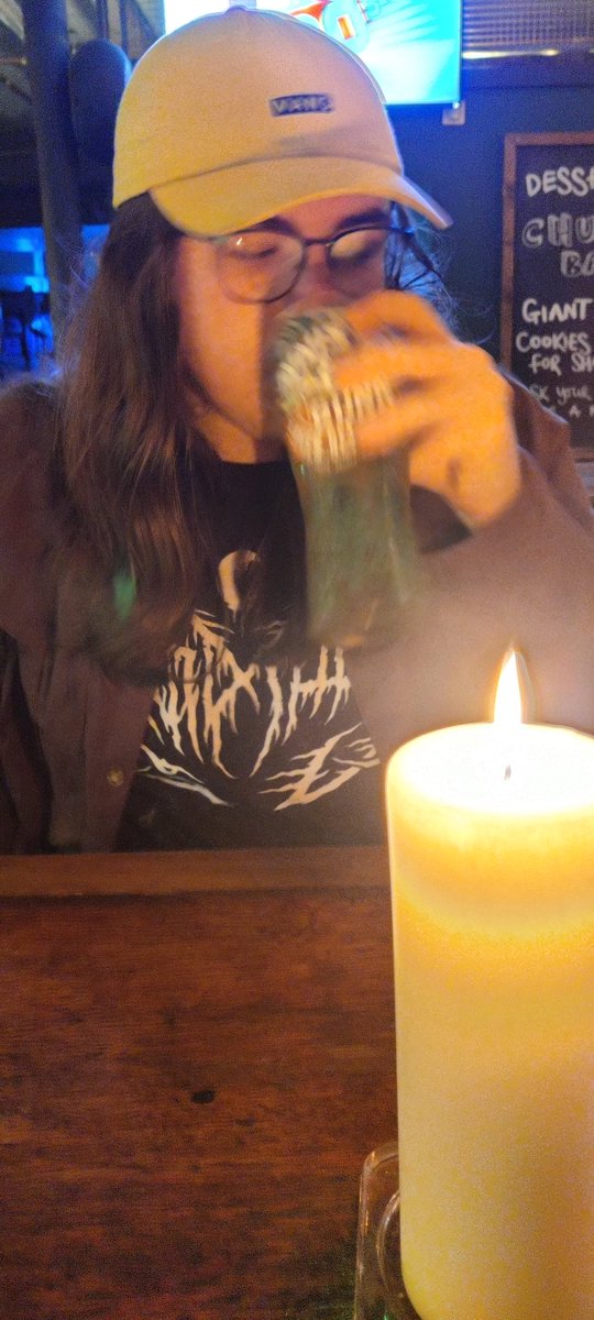 izzet_blissful's tweet photo. wee candlelit beer in the record store/bar around the corner from me with @tompilled https://t.co/ZmsOt5uNcP