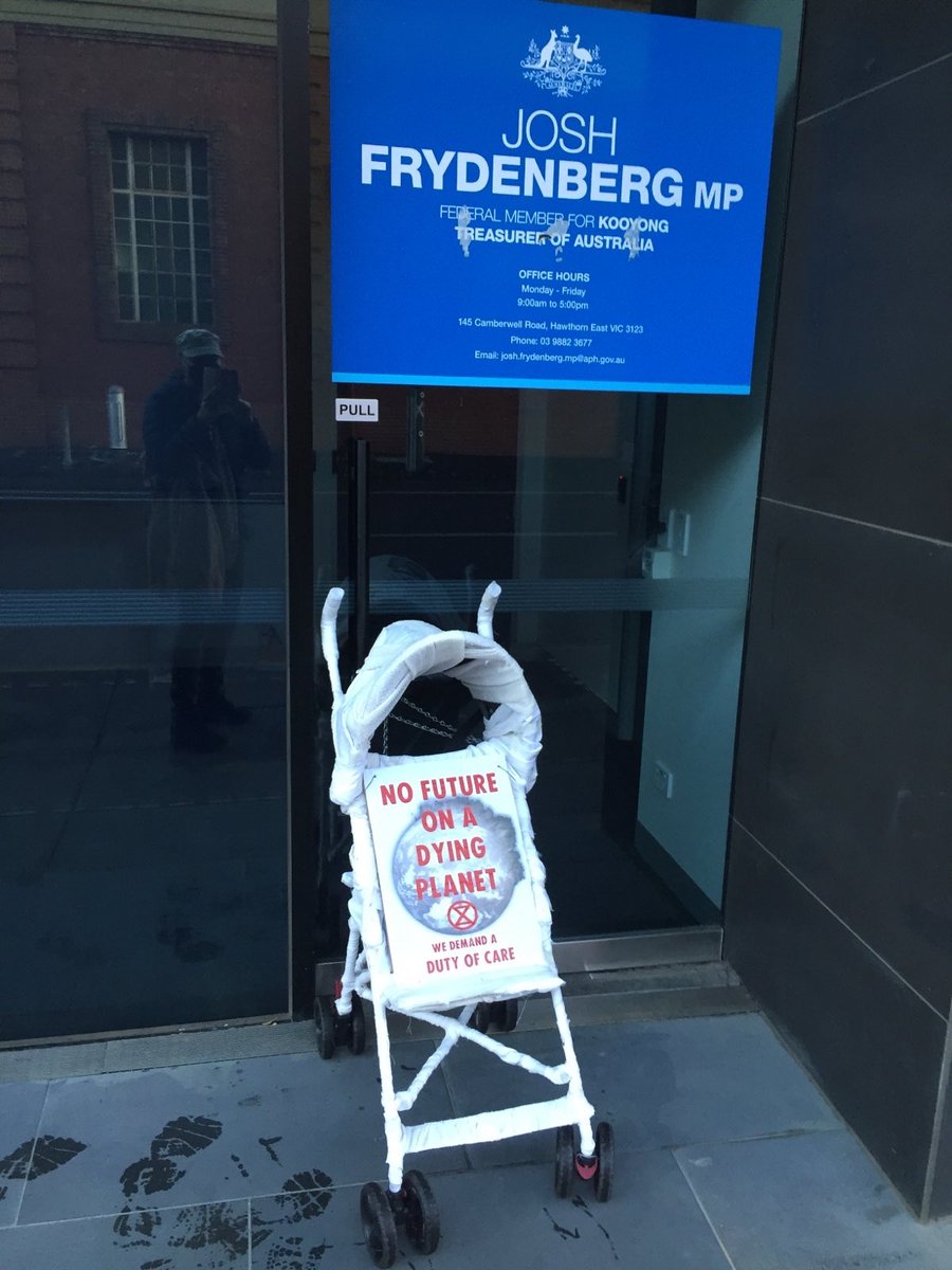 ReclaimRFuture's tweet photo. Installation at the office of @JoshFrydenberg this morning. Nothing is more important than the health of our planet. Everything else depends on it. #ReclaimOurFuture #DoingNothingRisksEverything https://t.co/61ARwZW9V5