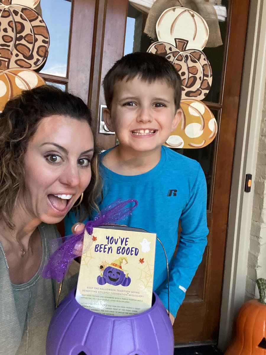EpilepsyMS's tweet photo. Our board member Nikki and her son enjoyed “booing” friends and neighbors with purple pumpkins 🎃 this past weekend! They incorporated epilepsy awareness gear as part of the treat. Let us know if we can email you the “Boo” template by emailing us at mississippi@efa.org. 💜 https://t.co/C1wpFOPPFd
