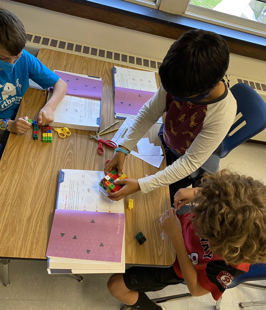 On Monday we jumped into a new math unit as we imagined ourselves working for a shipment company. What’s the greatest number of cubes that can be packed in each box? Teaming up to build and investigate!