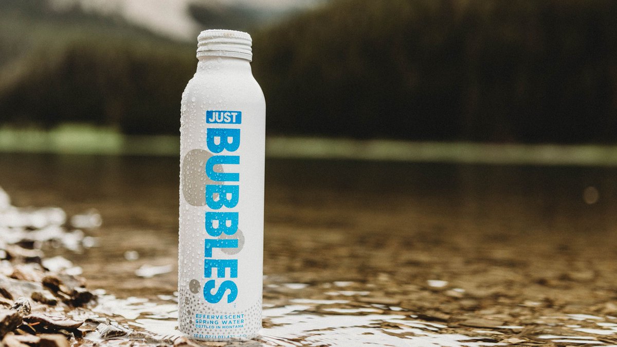 Introducing JUST Bubbles. This effervescent spring water comes from the 🏔 s of Montana with a bubbly twist! Filled with microbubbles that tickle and delight, bottled in an infinitely recyclable aluminum bottle. 💦 Shop Bubbles now: bit.ly/2Z7jL15 #SomethingIsBubbling