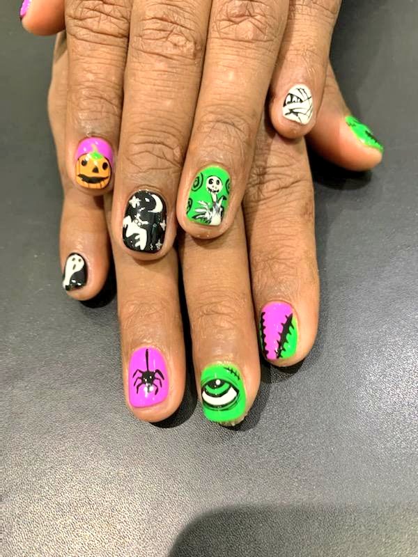 Chynadoll7645's tweet photo. Love my nail tech! All designs are done freestyle on super short natural nails!! Now that takes some talent!! #halloweenready #halloweennails https://t.co/c2oZQi7kk9
