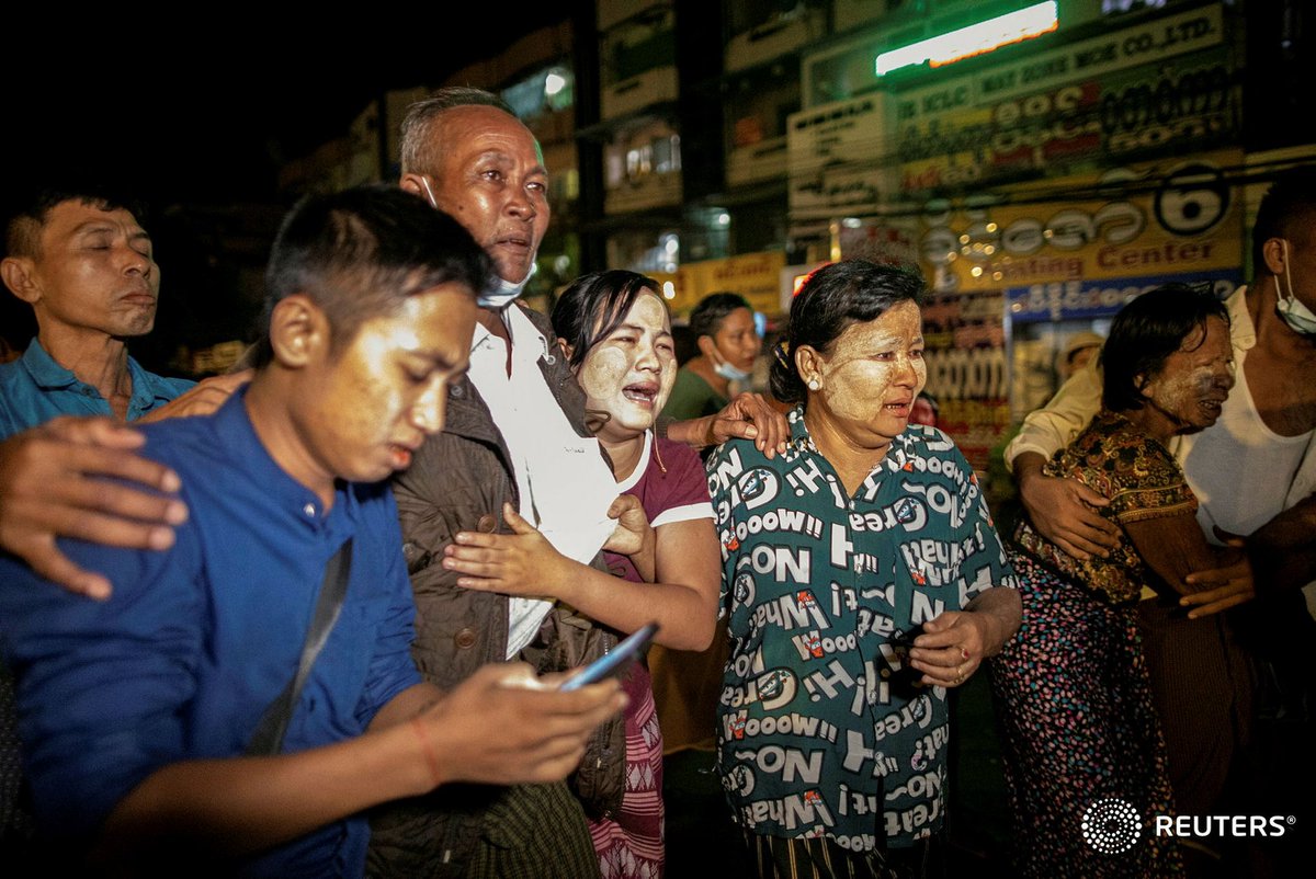 soezeya's tweet photo. People react outside Insein prison as Myanmar's Junta releases prisoners including people that protested against the military coup, in Yangon, Myanmar October 18, 2021. Picture taken October 18, 2021. REUTERS/Stringer https://t.co/3OrG9dKs29