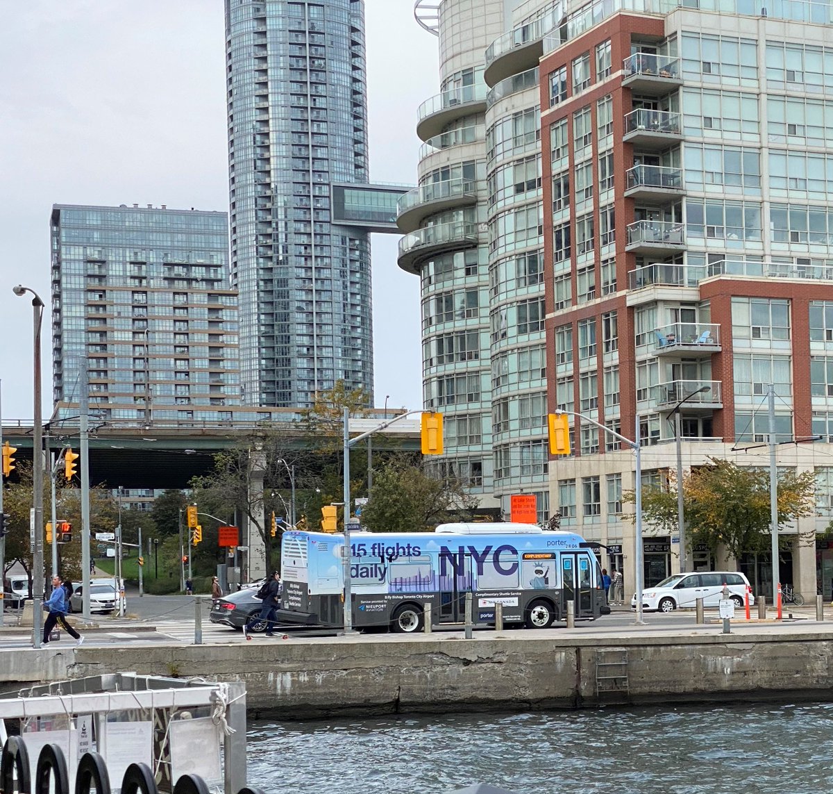 BBishopAirport's tweet photo. 👀 Spotted on Queen's Quay West, a sign you should visit NYC 🗽 

With endless things to do and see, and direct service from downtown Toronto aboard @PorterAirlines, New York is the perfect escape any time of the year. 

#PorterIsBack @EWRairport #YTZ https://t.co/ASE1xR8jgX