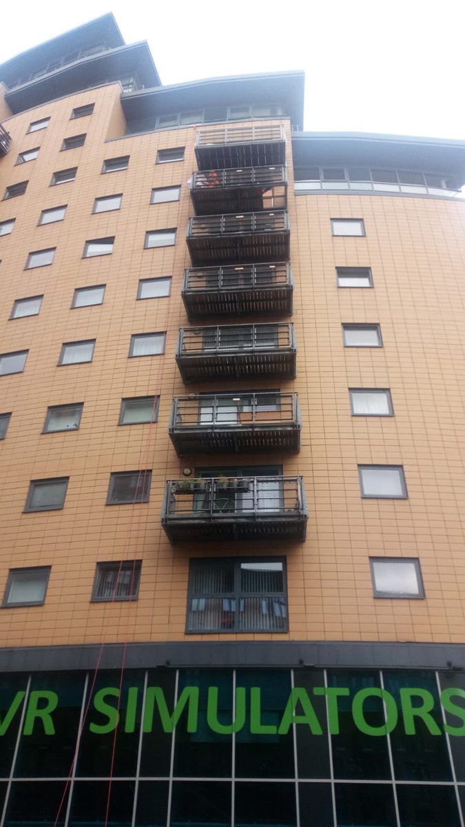 watsonPM_UK's tweet photo. Excited to see the balconies start their remediation at Blue Granary, not sure we’d be brave enough to abseil! #buildingsafety https://t.co/zoWKSDlSAa