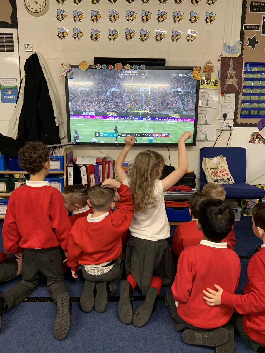 StMagsPE's tweet photo. Some of our KS1 children loved seeing highlights of @Jaguars vs @MiamiDolphins during wet playtime. 
Well done @Trevorlawrencee and the team #DUUUVAL
@JaguarsUK @EdstartHQ @EdStartBury @ryancousa @NFLUK https://t.co/ZdracuIvLb