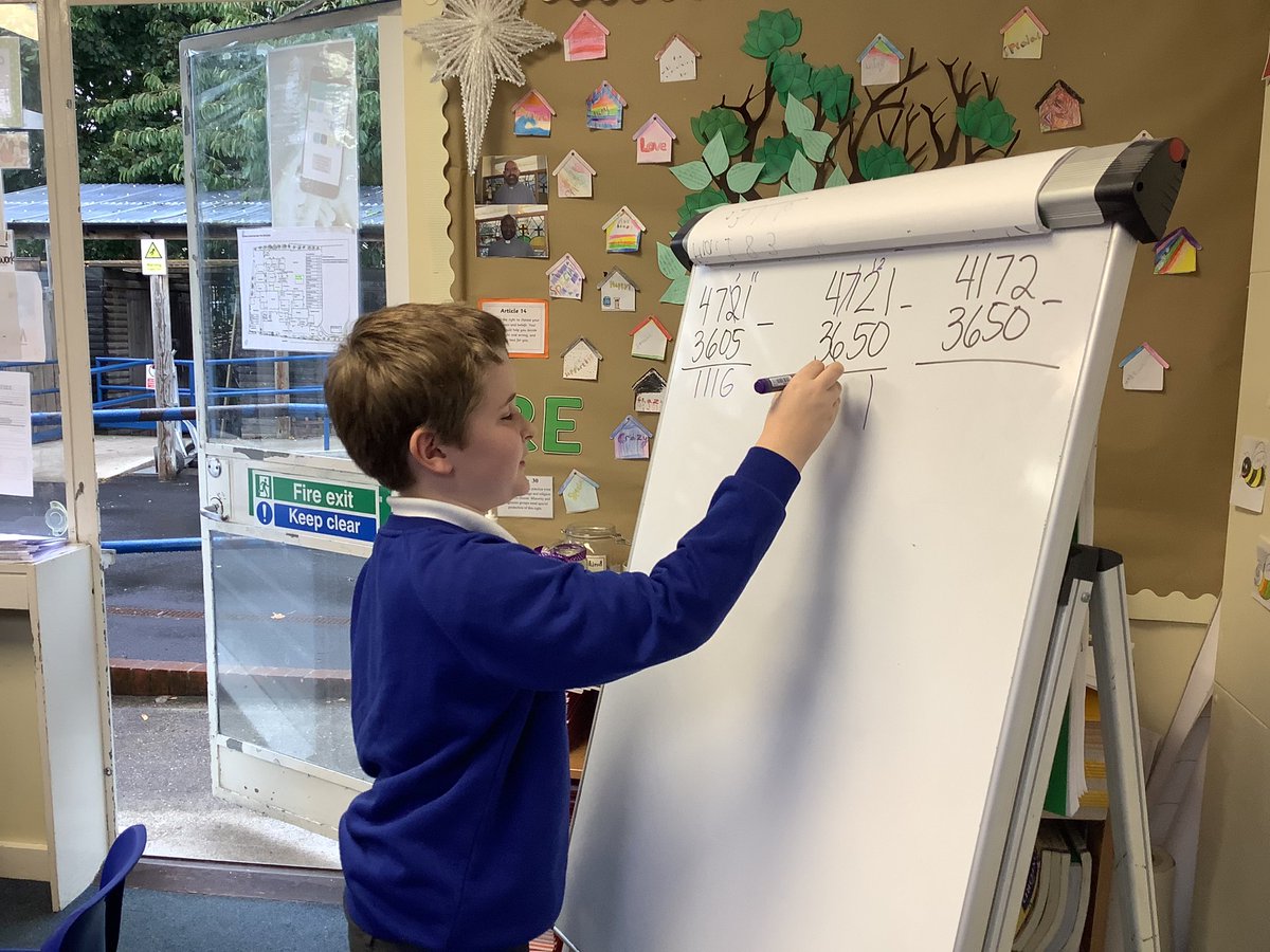 StMarysSchoolRC's tweet photo. These amazing children are teaching us how to subtract with exchange #smrcMaths #Year4Maths https://t.co/2Sykk6FXMp