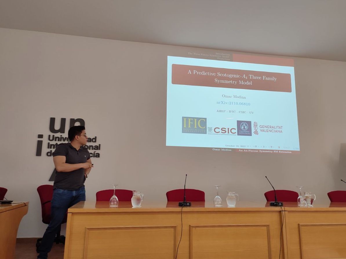 AHEPGroup's tweet photo. The PhD student Omar Medina was the first AHEPian speaker of the evening session at the 18th #MultiDark Consolider Workshop. He talked about a proposal of an A4 three family symmetry model with several predictions for the flavour observables. https://t.co/1y3LUS2jHm