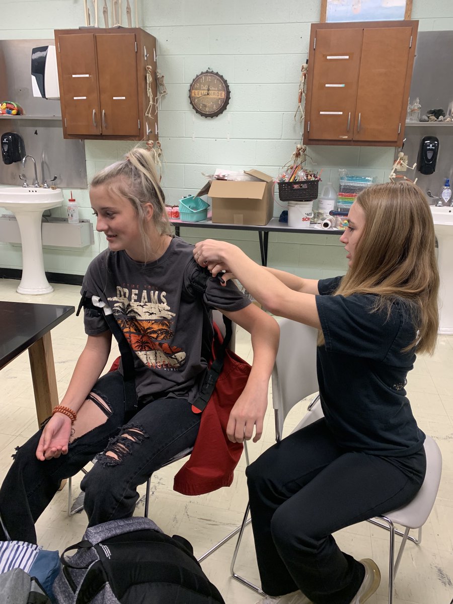 AveryCountyCTE's tweet photo. Students in Dr. Hawkins Health Science classes learned how to "Stop the Bleed" from army combat medics. Students practiced applying tourniquets. #AveryCTE #HealthSciences https://t.co/oLiv3G8x17
