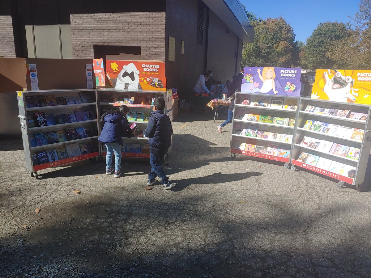 The Books are BACK!!  Great day for the return of the BOOK FAIR outdoors!!  Thanks to our WONDERFUL PTA for their help to bring it back!!  Now let's get to reading!!