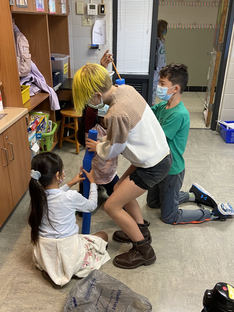 MillB19's tweet photo. Team building Tuesday! Reassembling a pool noodle. Much harder than it looks. @ireDCSD https://t.co/TyHtVTIgUC