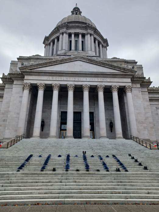 KelleeAzar's tweet photo. Today, now former troopers with Washington State Patrol laid their boots and campaign hats on the steps of the Capitol Building to show represent those lost because of the statewide vaccine mandate. #LiveOnK2 https://t.co/84WB7kUG4S